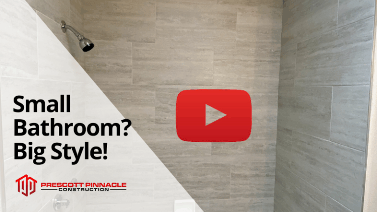 small bathroom with renovated tile and shower head