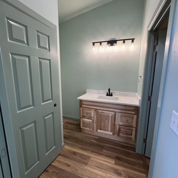 flooring-installation-bathroom-vanity-prescott-pinnacle-construction-dewey